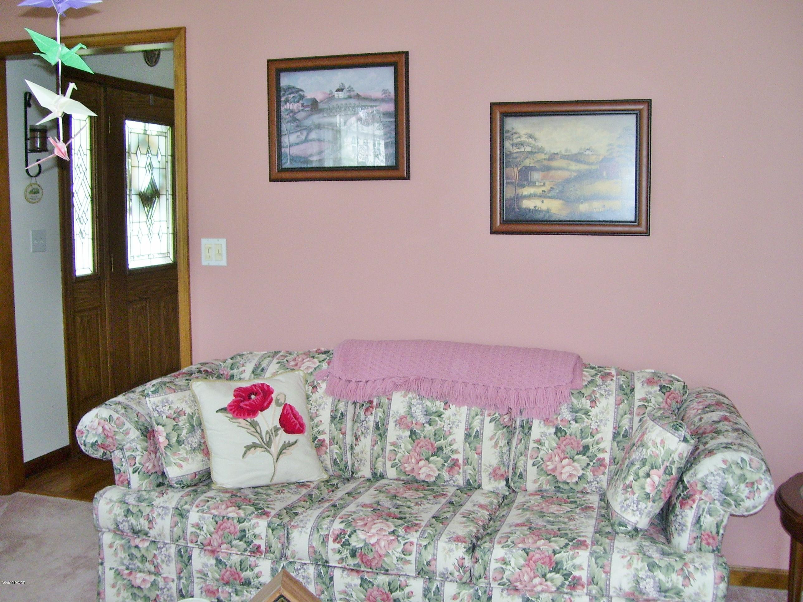 50 Layton Road Waymart, PA 18472 - Photo 8 of 61 a bedroom with a bed and a couch
