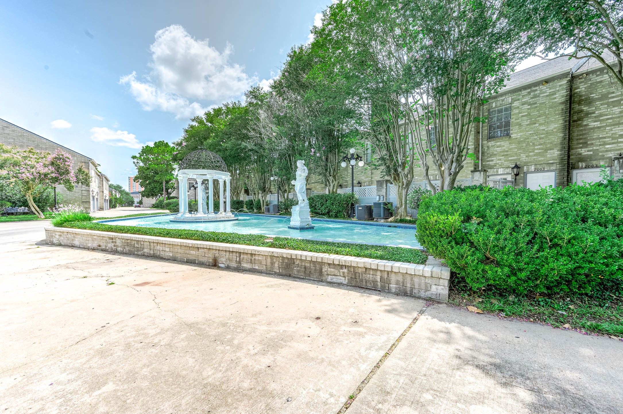 6000 Reims Road, Unit 2003 Houston, TX 77036 - Photo 2 of 24 a house view with a garden space