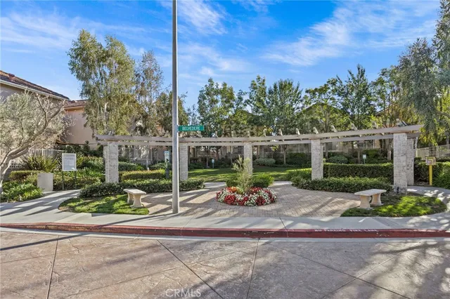 a view of a chair and tables in the patio