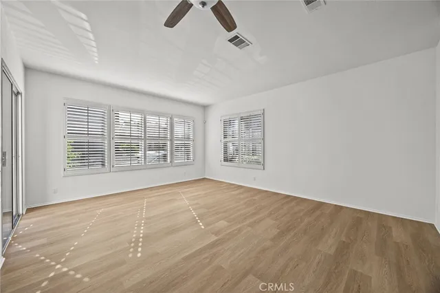 an empty room with windows