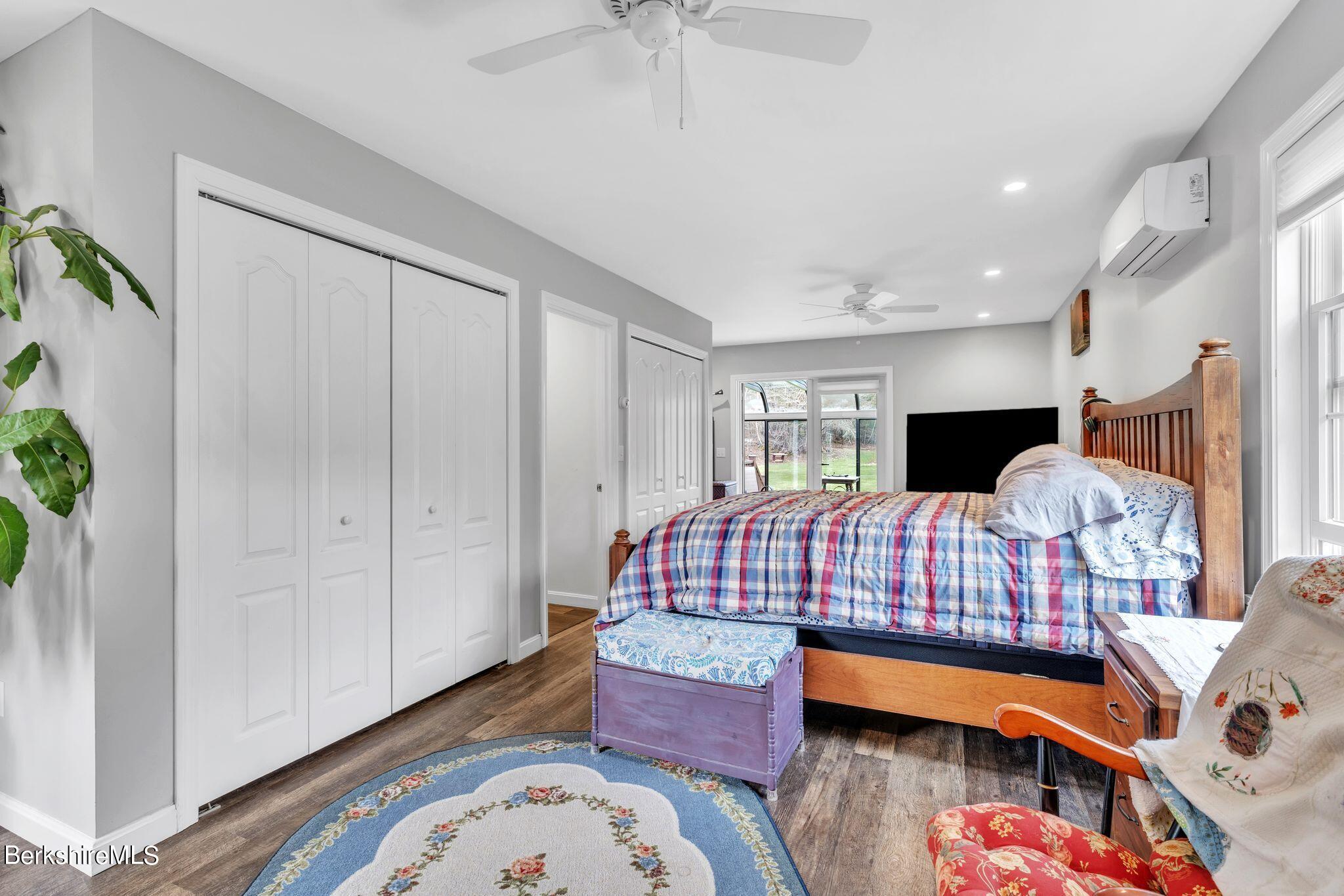 696 River Road Windsor, MA 01270 - Photo 17 of 42 a bedroom with furniture and a window