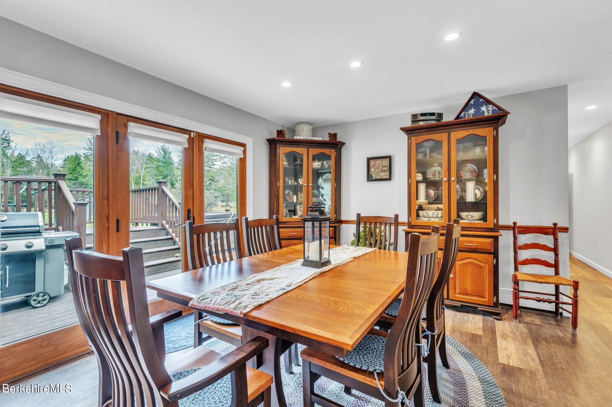 696 River Road Windsor, MA 01270 - Photo 10 of 42 a view of a dining room with furniture window and wooden floor
