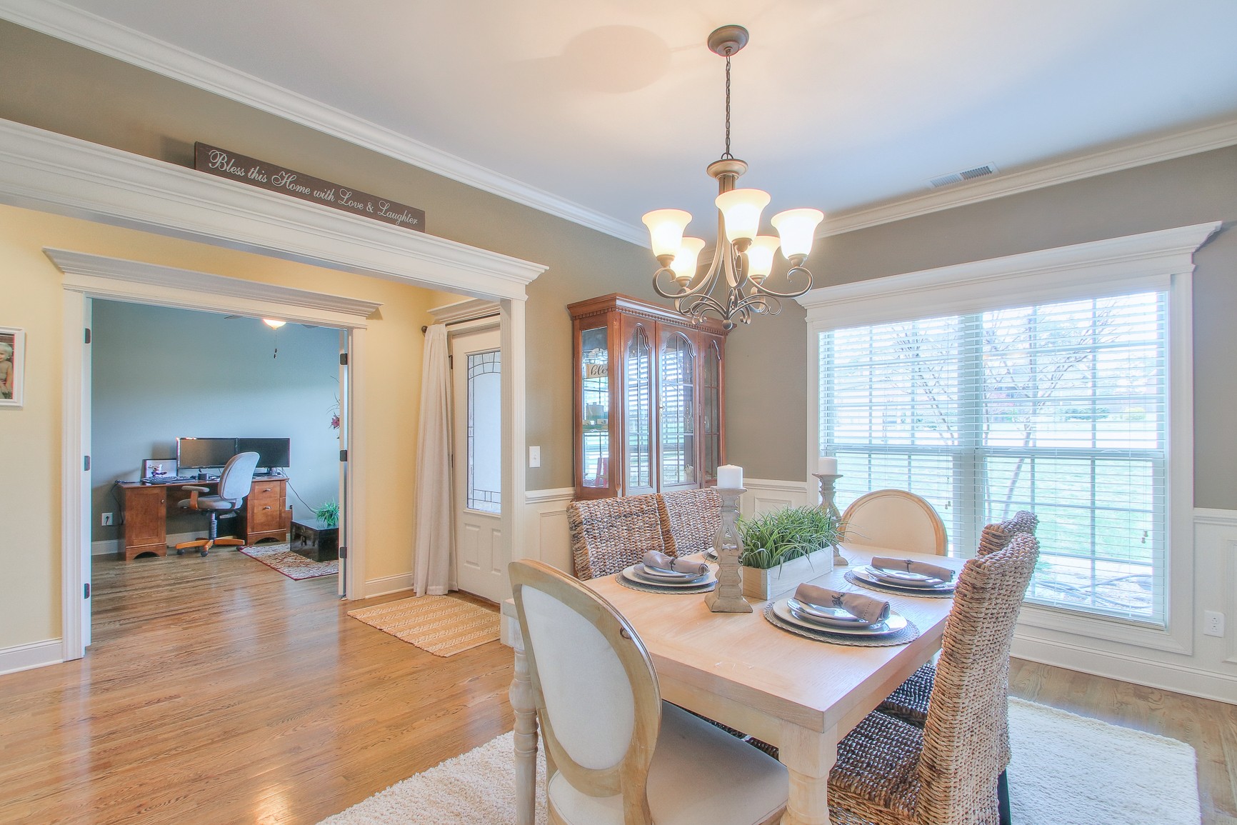 1102 Black Jack Way Murfreesboro, TN 37129 - Photo 11 of 48 a view of a dining room with furniture wooden floor and chandelier