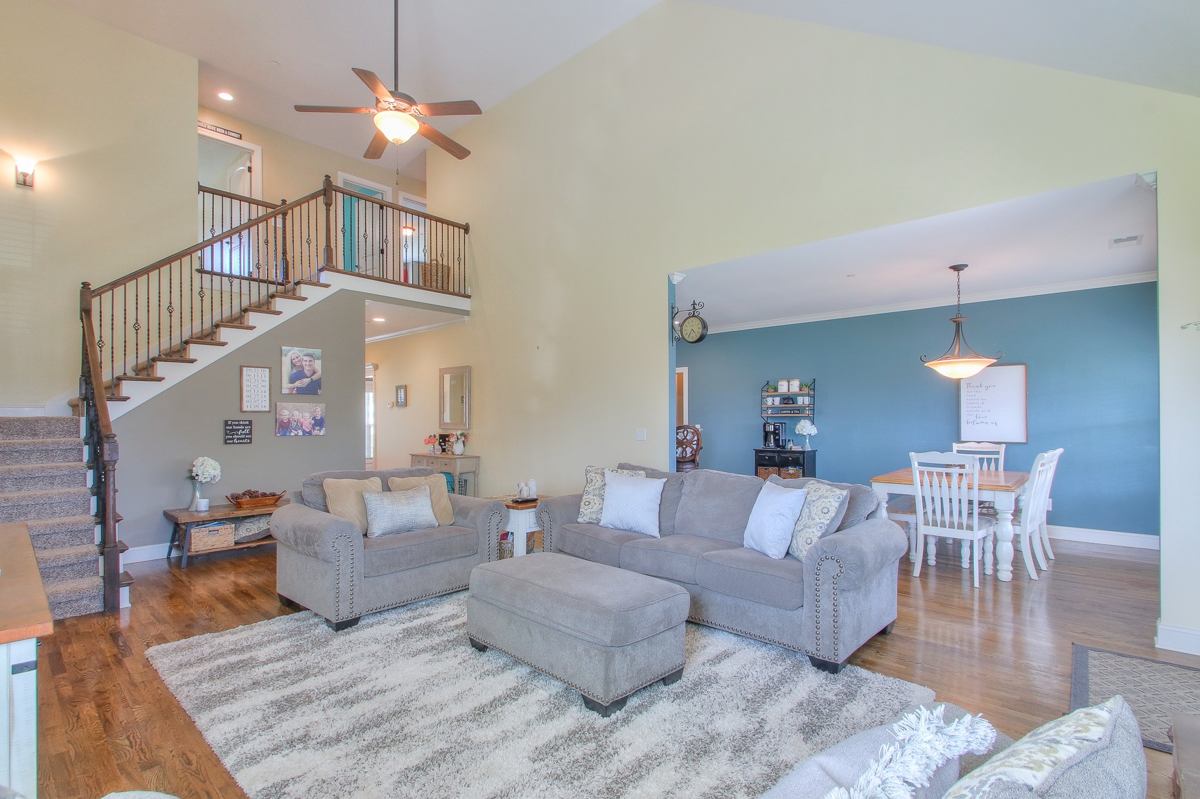 1102 Black Jack Way Murfreesboro, TN 37129 - Photo 18 of 48 a living room with furniture a dining table and a chandelier