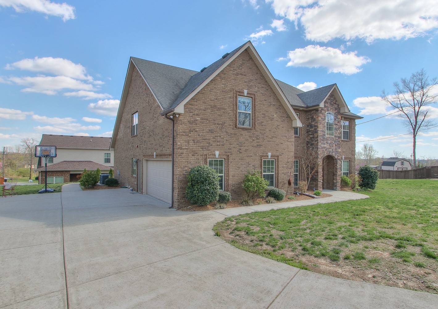1102 Black Jack Way Murfreesboro, TN 37129 - Photo 3 of 48 a front view of a house with a yard and garage