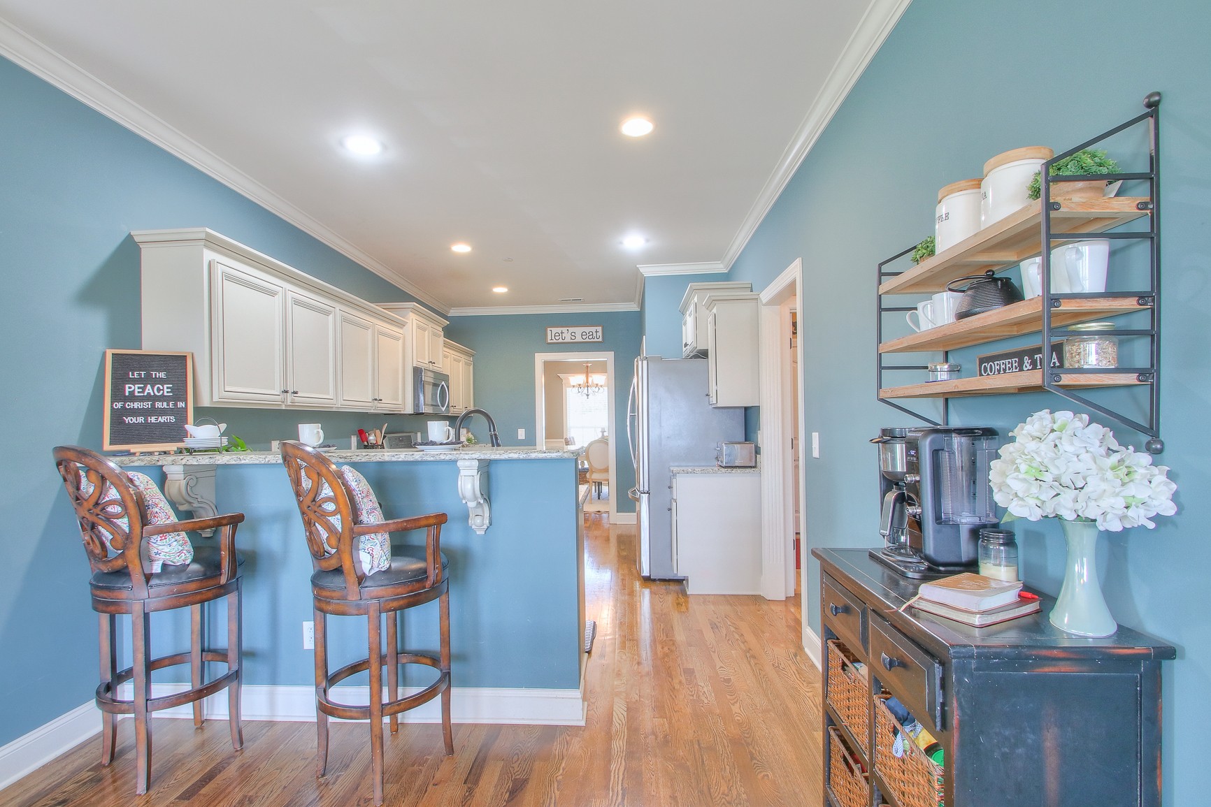 1102 Black Jack Way Murfreesboro, TN 37129 - Photo 22 of 48 a view of kitchen with stainless steel appliances granite countertop dining table chairs and wooden floor