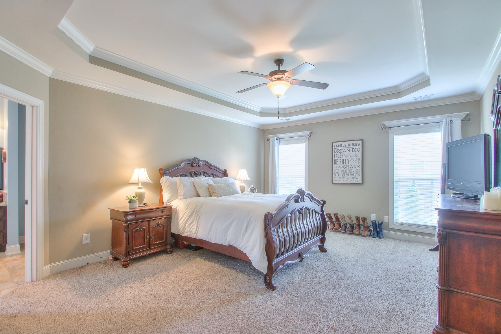 1102 Black Jack Way Murfreesboro, TN 37129 - Photo 27 of 48 a spacious bedroom with a bed and a chandelier
