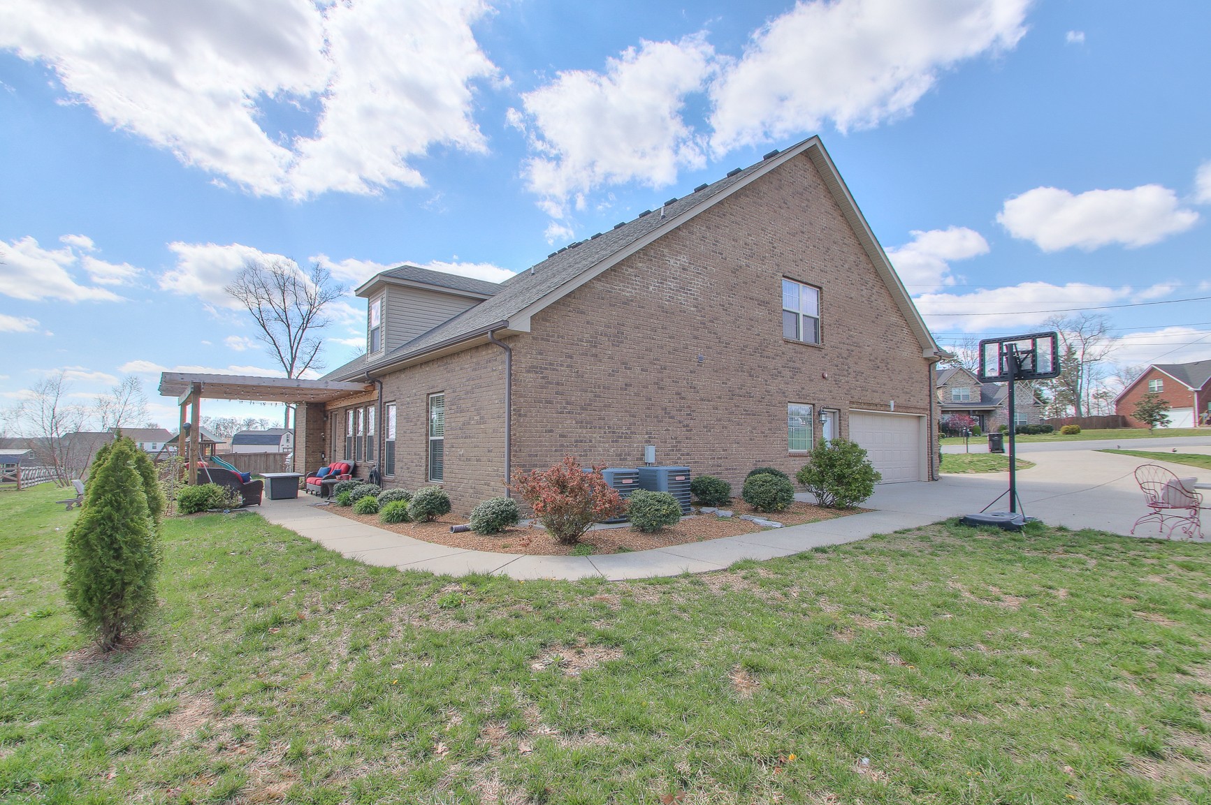 1102 Black Jack Way Murfreesboro, TN 37129 - Photo 4 of 48 a backyard of a house with table and chairs