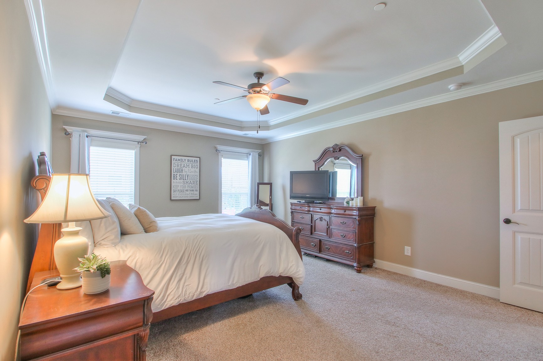 1102 Black Jack Way Murfreesboro, TN 37129 - Photo 33 of 48 a bedroom with a bed chandelier dresser and a window