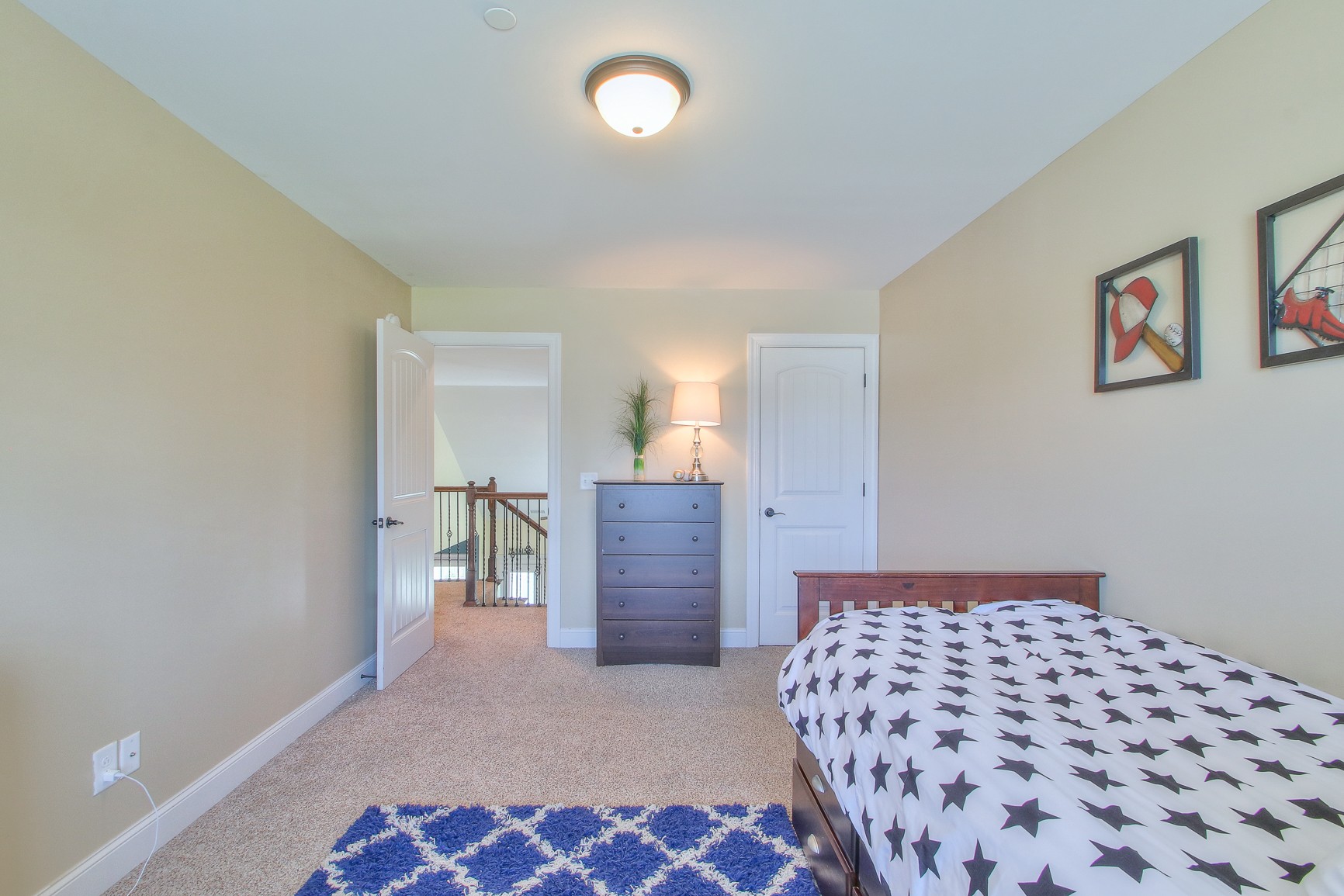 1102 Black Jack Way Murfreesboro, TN 37129 - Photo 36 of 48 a bedroom with a bed and a lamp