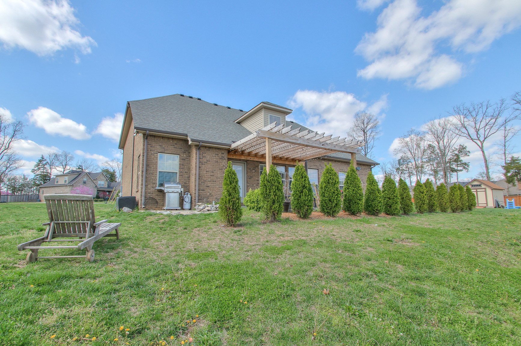 1102 Black Jack Way Murfreesboro, TN 37129 - Photo 5 of 48 a view of a house with a big yard and potted plants