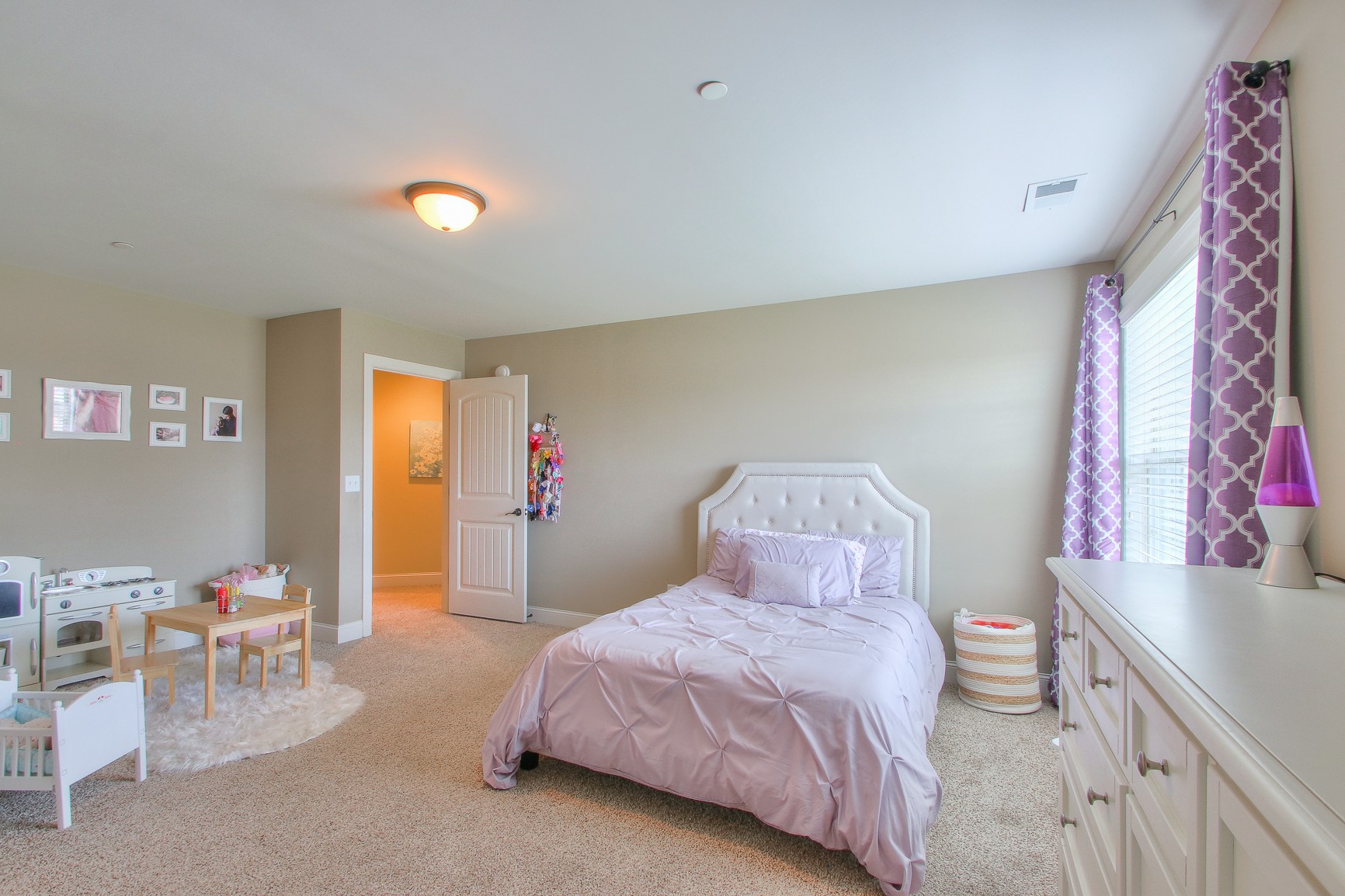 1102 Black Jack Way Murfreesboro, TN 37129 - Photo 43 of 48 a bedroom with a bed and a table