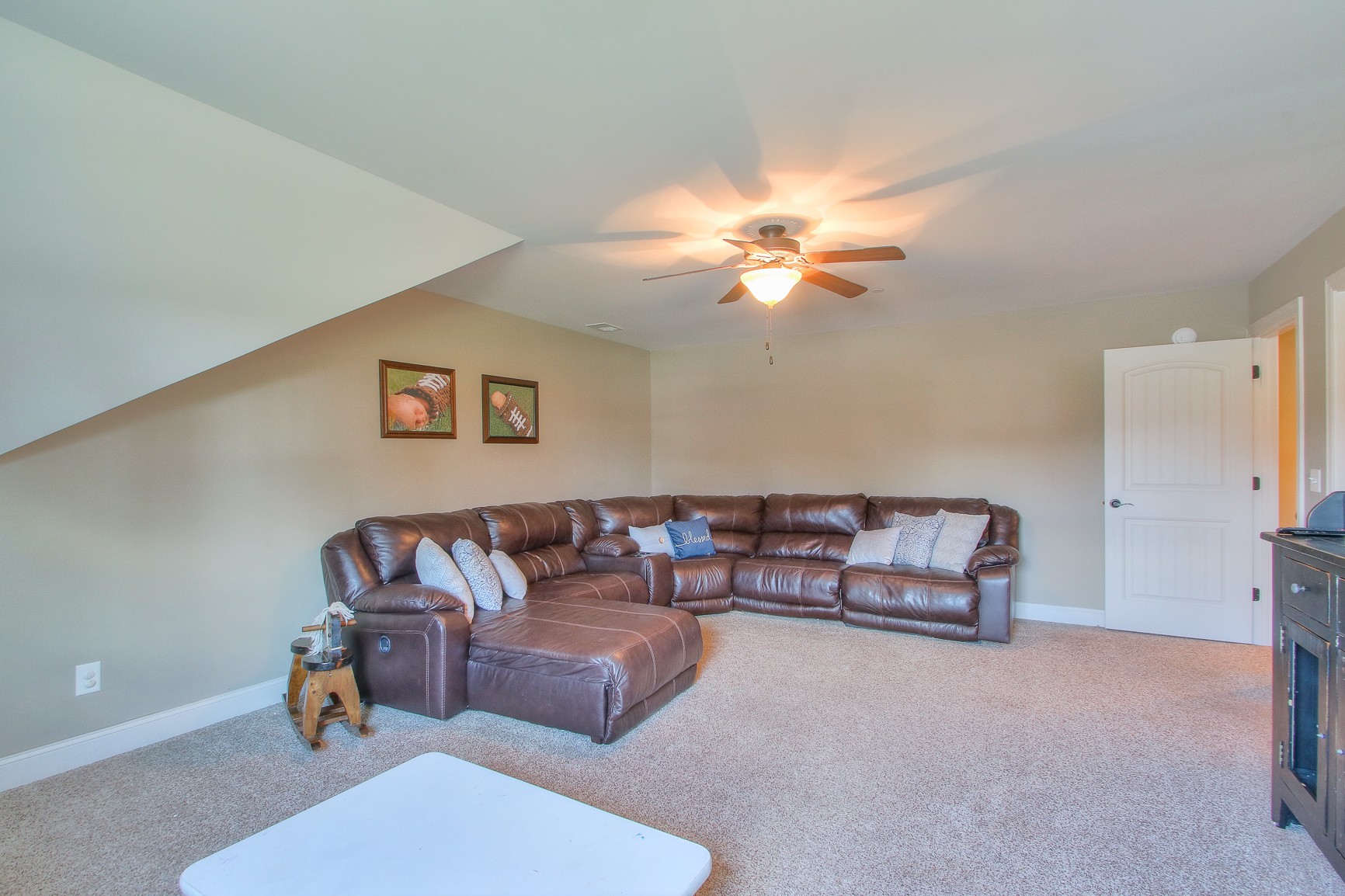 1102 Black Jack Way Murfreesboro, TN 37129 - Photo 47 of 48 a living room with furniture and a chandelier