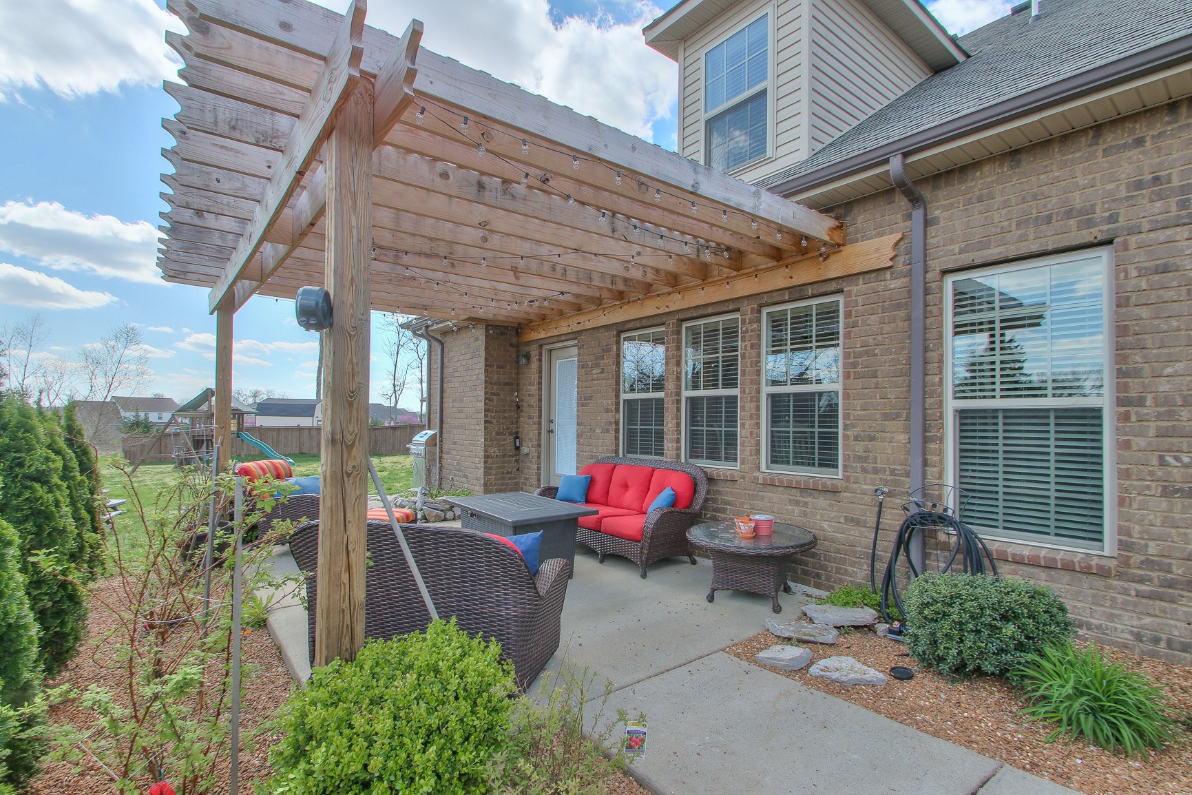 1102 Black Jack Way Murfreesboro, TN 37129 - Photo 7 of 48 a front view of a house with outdoor seating