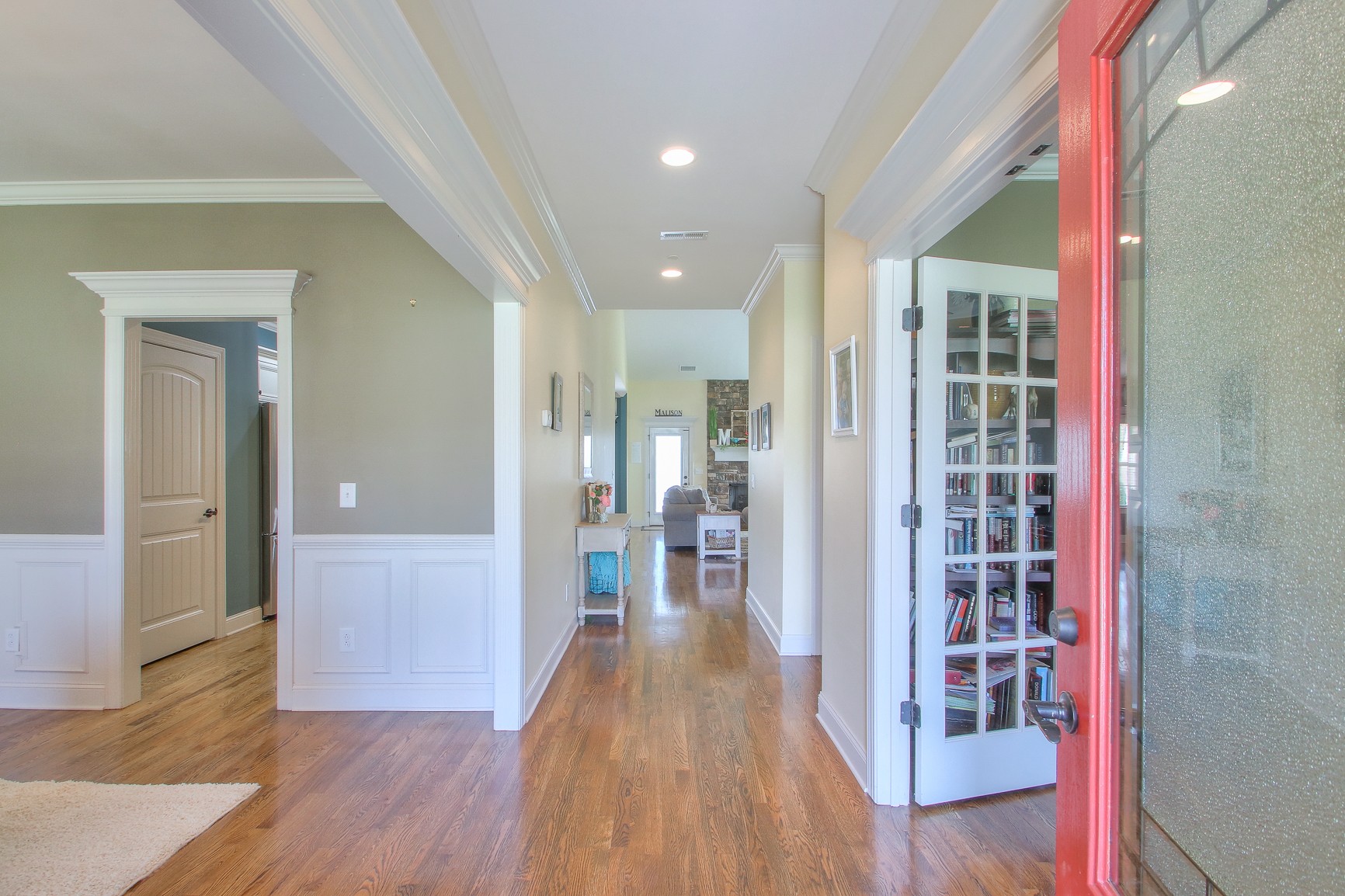 1102 Black Jack Way Murfreesboro, TN 37129 - Photo 9 of 48 a view of a hallway with wooden floor windows and livingroom