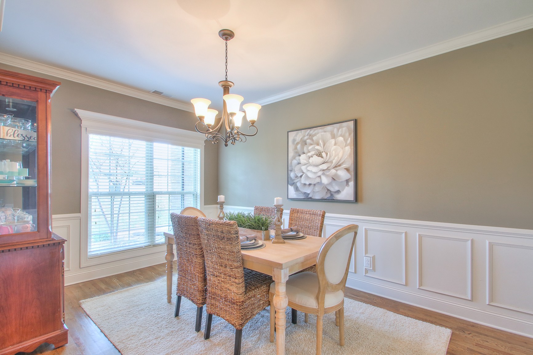 1102 Black Jack Way Murfreesboro, TN 37129 - Photo 10 of 48 a view of a dining room with furniture wooden floor and a chandelier