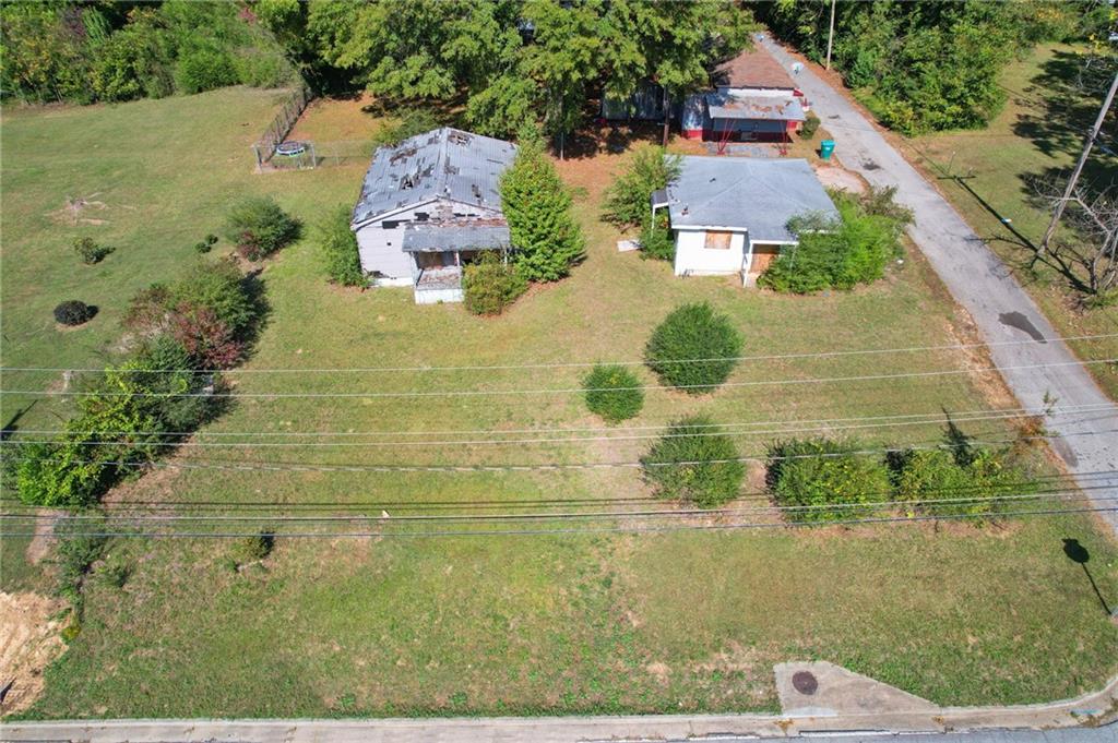 21 Elm Street Hampton, GA 30228 - Photo 5 of 13 an aerial view of a house with a yard