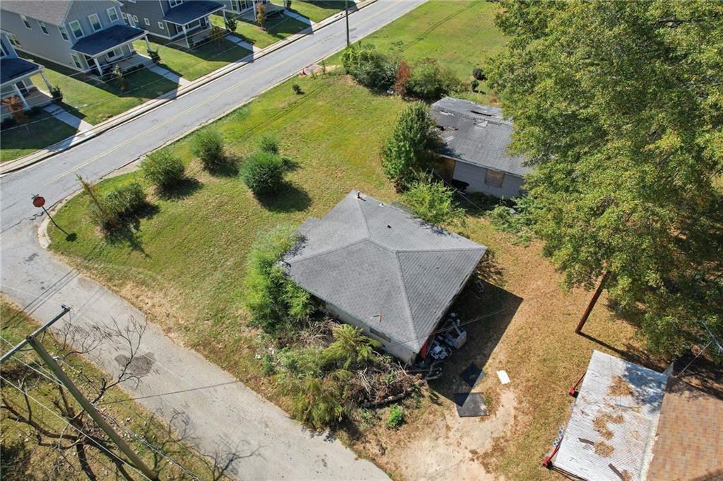 21 Elm Street Hampton, GA 30228 - Photo 7 of 13 an aerial view of a house with a yard