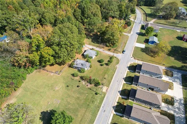an aerial view of residential house with outdoor space