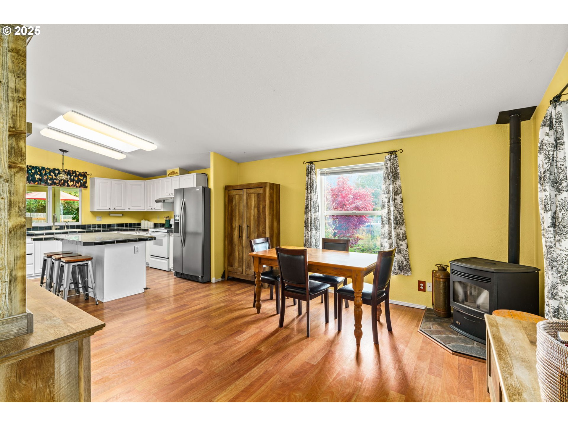 47849 West 2nd Street Oakridge, OR 97463 - Photo 12 of 45 a dining room with furniture and wooden floor
