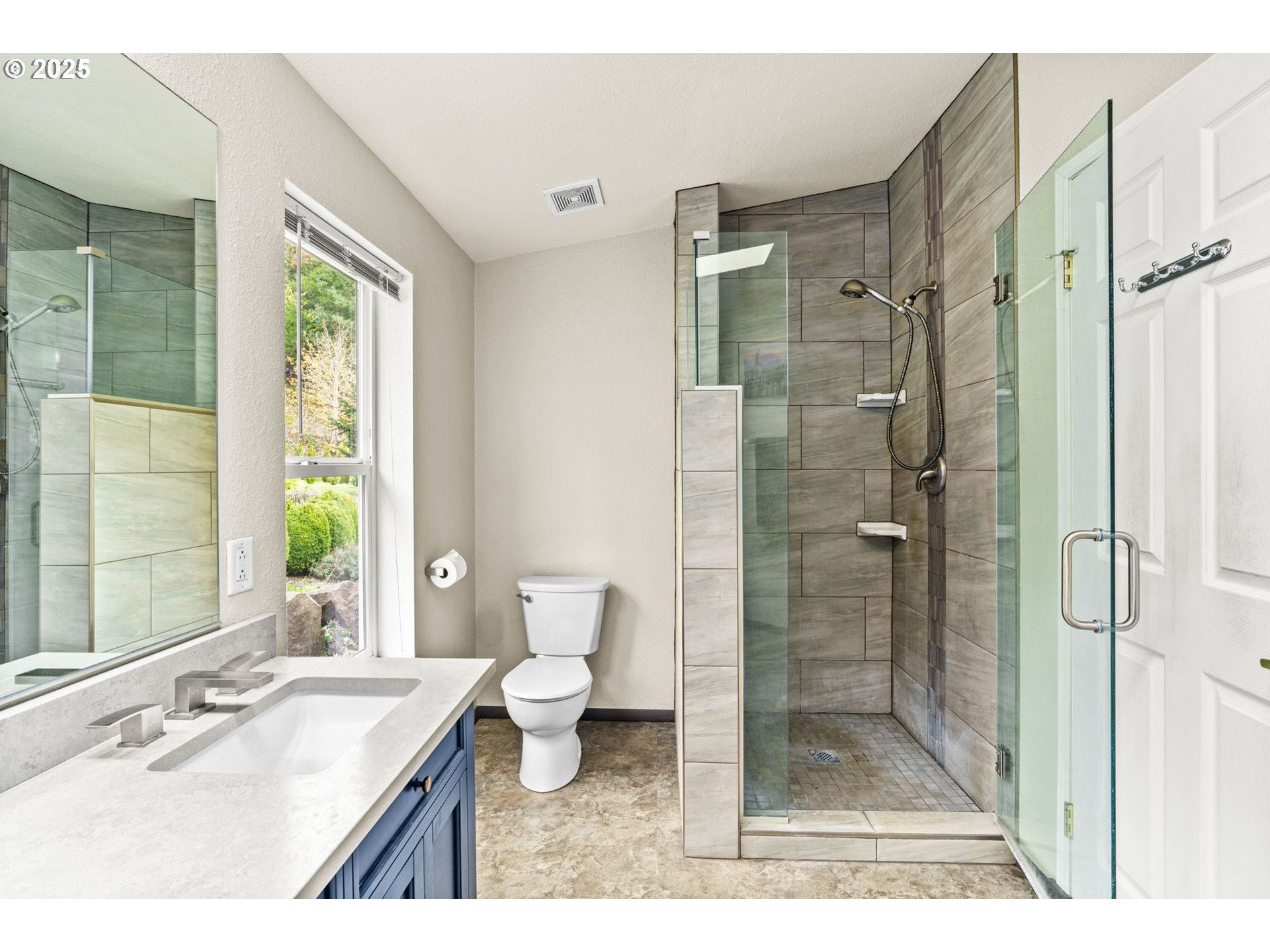 47849 West 2nd Street Oakridge, OR 97463 - Photo 19 of 45 a bathroom with a sink toilet a shower and a mirror