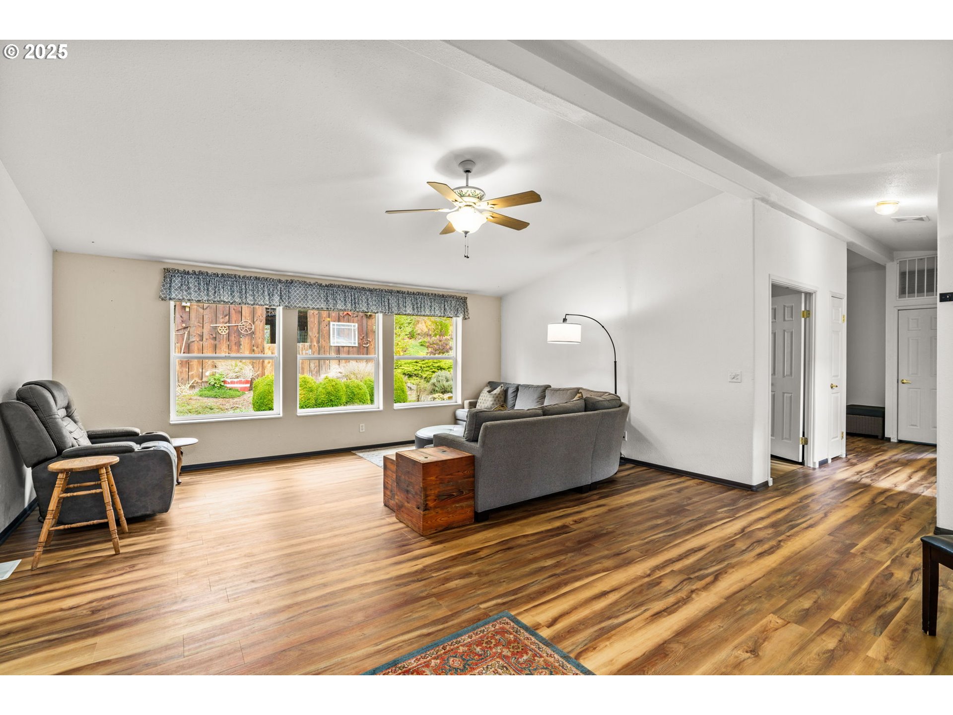 47849 West 2nd Street Oakridge, OR 97463 - Photo 20 of 45 a living room with furniture window and wooden floor
