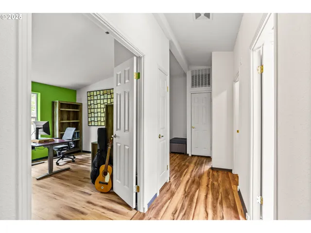 a view of a living room and bathroom