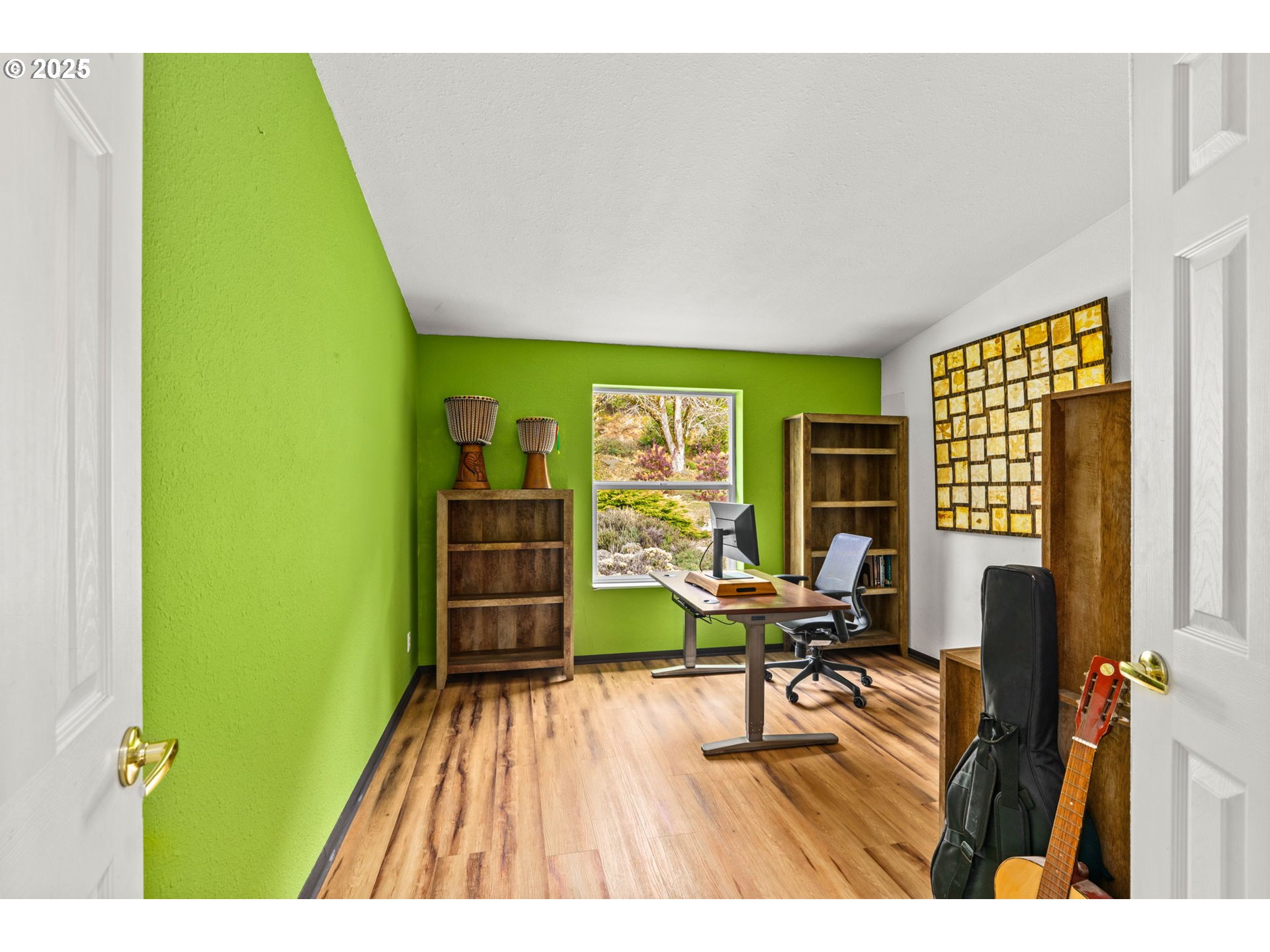 47849 West 2nd Street Oakridge, OR 97463 - Photo 22 of 45 a living room with a table chair and a large window