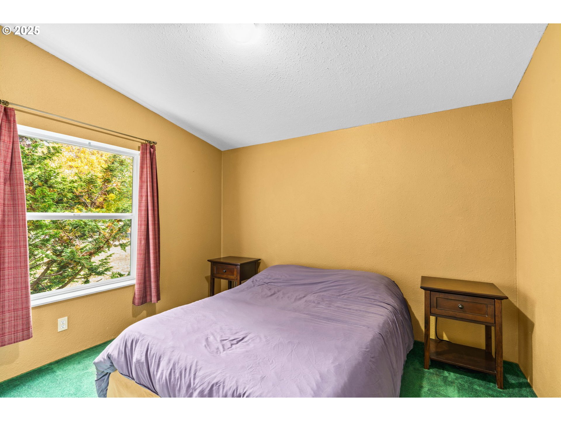 47849 West 2nd Street Oakridge, OR 97463 - Photo 25 of 45 a bedroom with a bed dresser and a window
