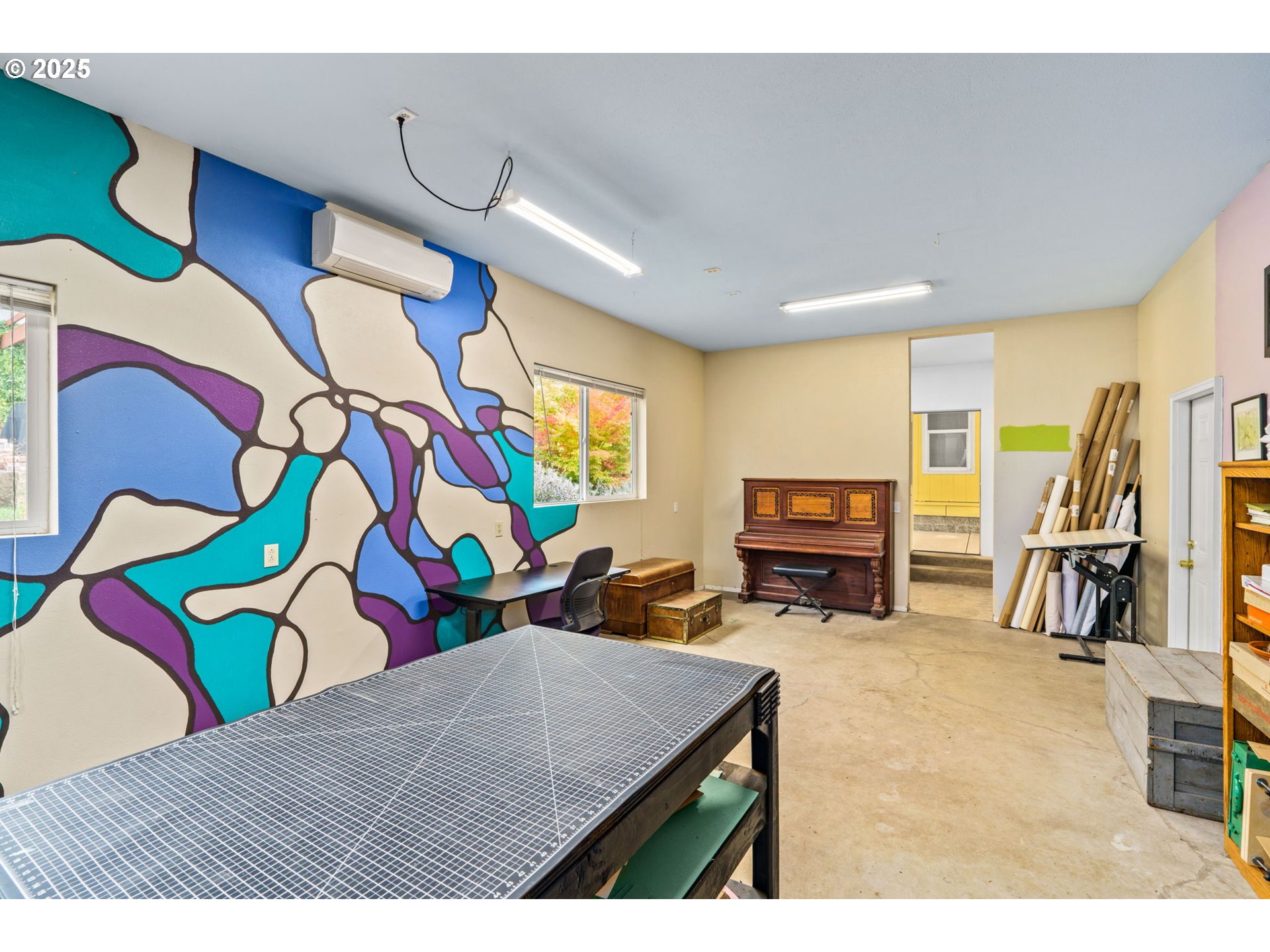 47849 West 2nd Street Oakridge, OR 97463 - Photo 31 of 45 a bedroom with furniture and a flat screen tv