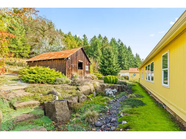 a view of a yard with an outdoor space