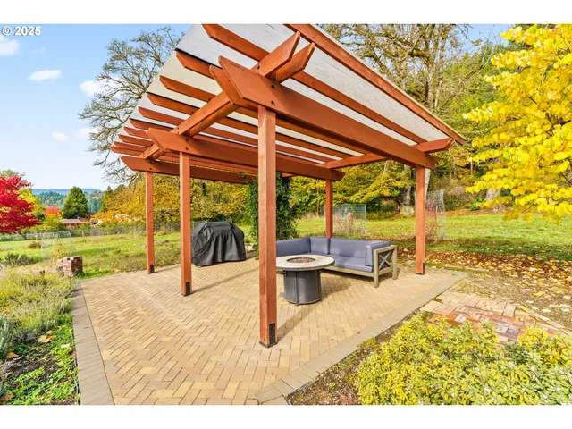 a view of a swimming pool with a patio