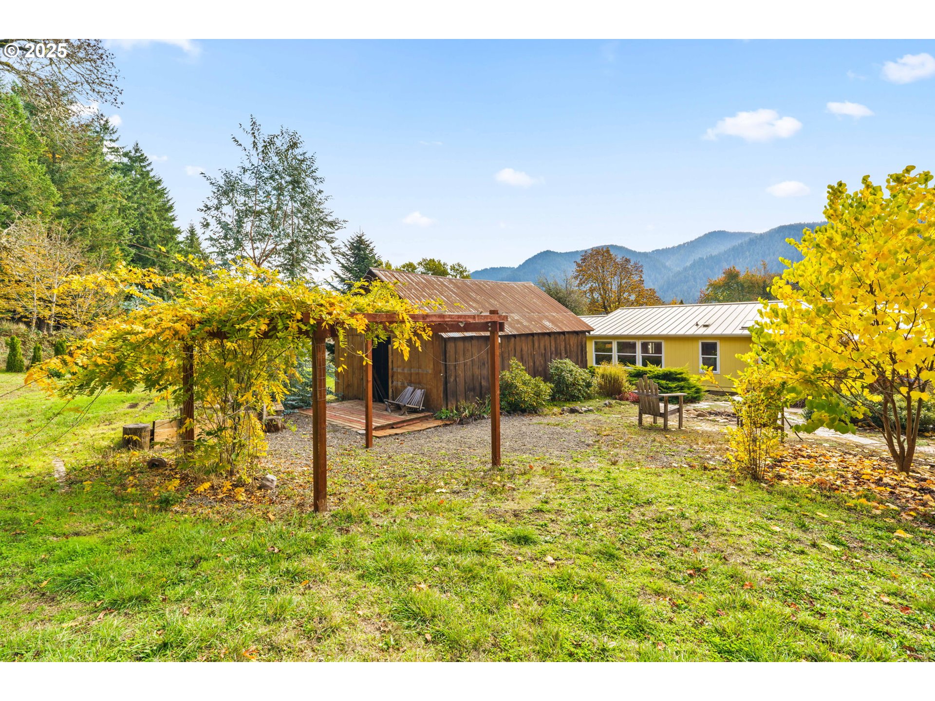 47849 West 2nd Street Oakridge, OR 97463 - Photo 35 of 45 a swimming pool with some tall trees