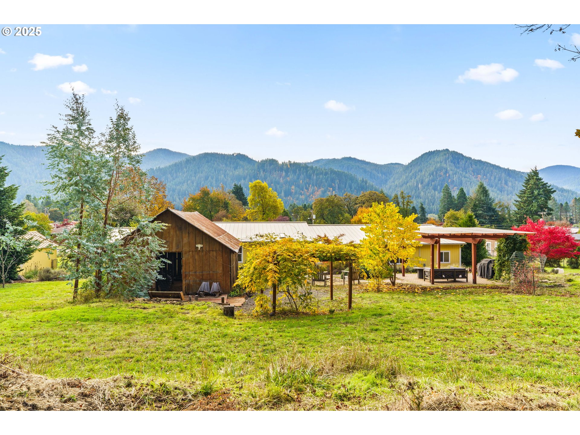 47849 West 2nd Street Oakridge, OR 97463 - Photo 36 of 45 a view of an house with outdoor space and seating area