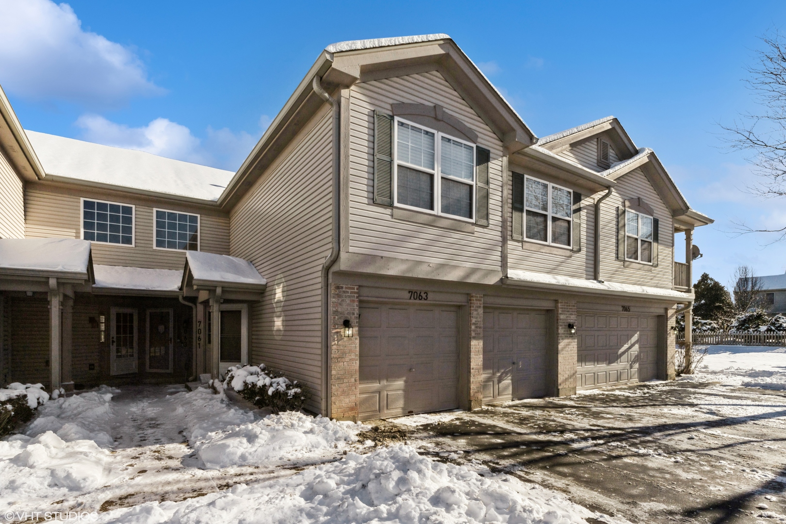 7063 South Stratton Lane Gurnee, IL 60031 - Photo 1 of 1 a front view of a house with a yard