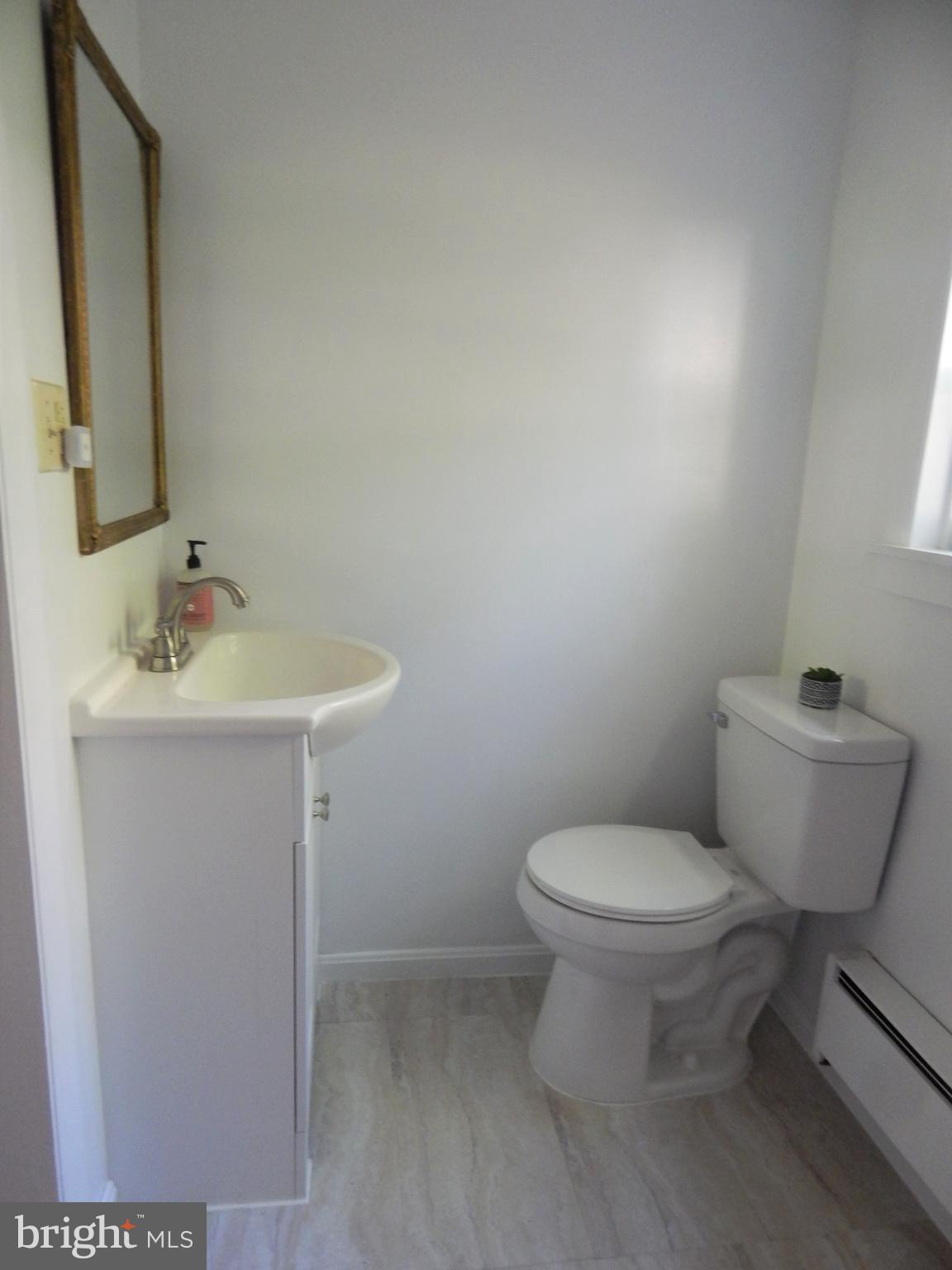 6024 Poplar Road St. Leonard, MD 20685 - Photo 9 of 30 Half bath main level with shower