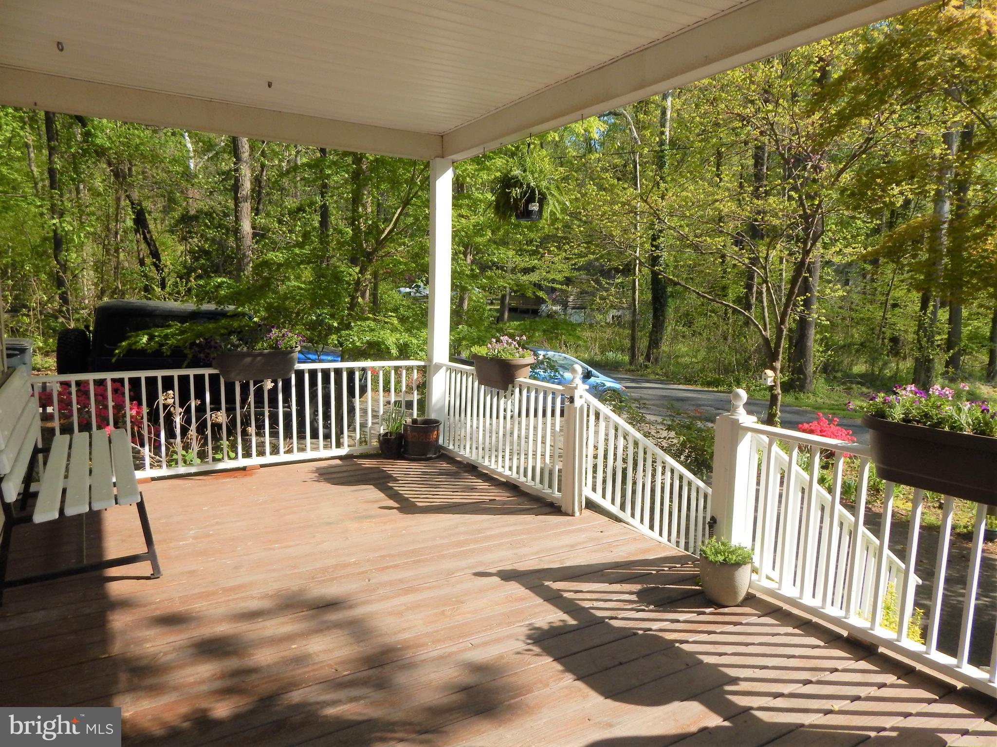 6024 Poplar Road St. Leonard, MD 20685 - Photo 10 of 30 Large porch for relaxing