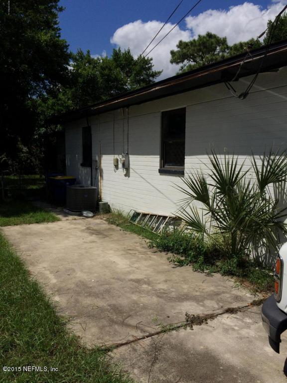 3138 Rogero Road Jacksonville, FL 32277 - Photo 3 of 12 a house view with a backyard space