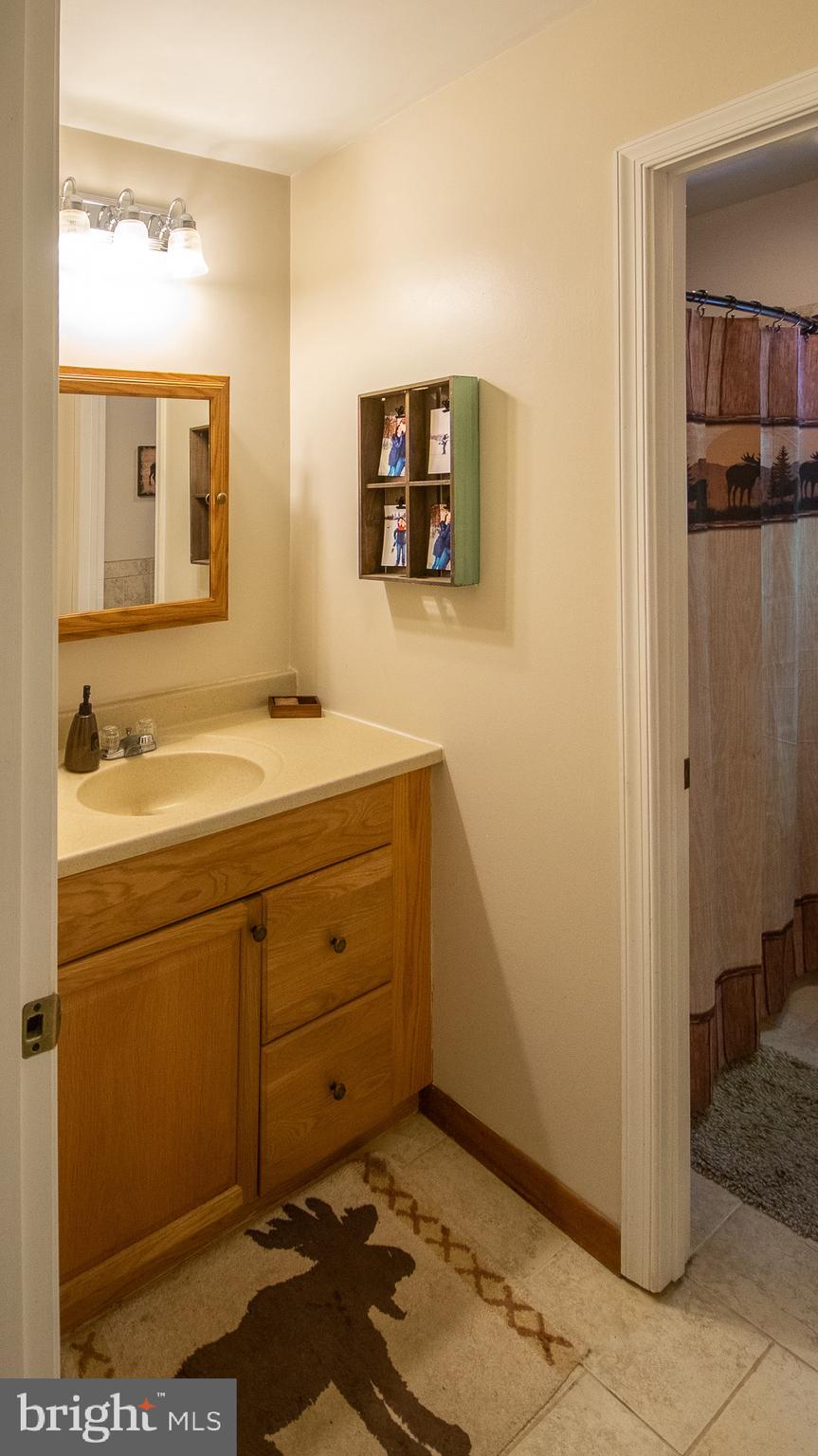 2423 Cub Hill Road Baltimore, MD 21234 - Photo 14 of 26 Upper Level Full Bath