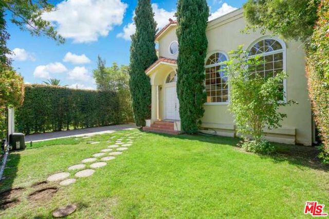 a view of a garden with pathway