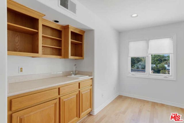 a large spacious bathroom with a large tub shower and sink