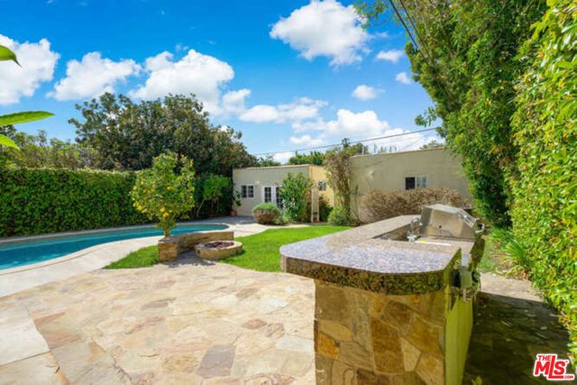a view of a house with swimming pool