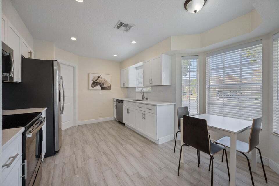 1050 Aviary Road Wellington, FL 33414 - Photo 9 of 21 A Kitchen 2