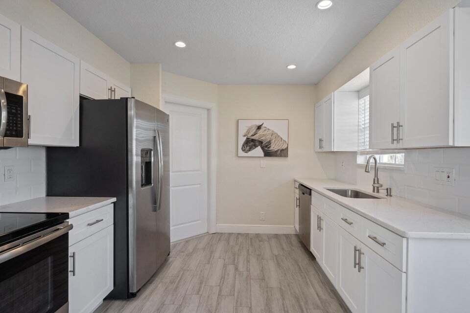 1050 Aviary Road Wellington, FL 33414 - Photo 10 of 21 A Kitchen 3