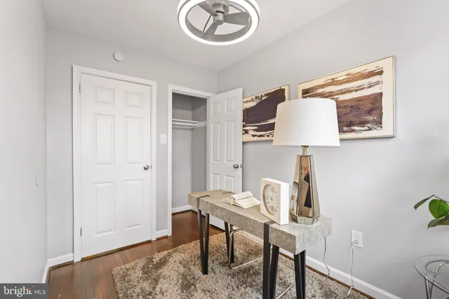 a view of a workspace with furniture