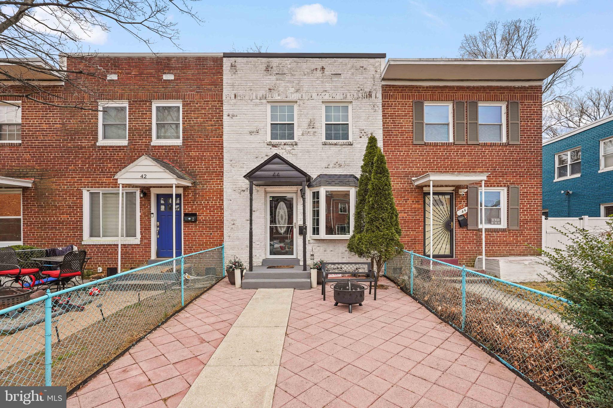 44 Dale Street Alexandria, VA 22305 - Photo 2 of 40 a front view of a house with many windows