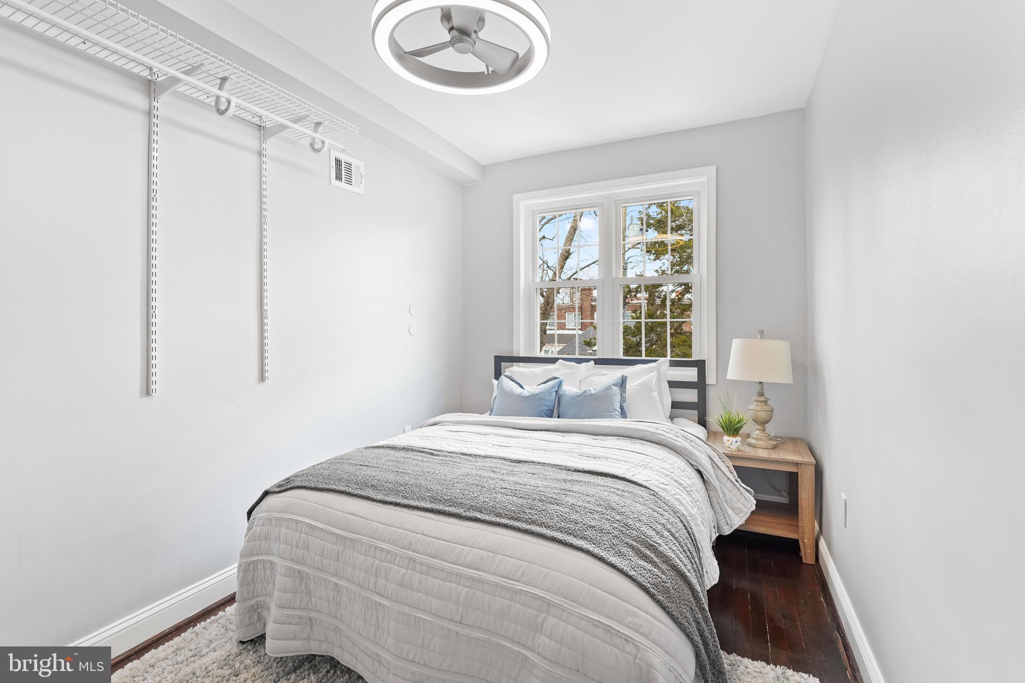 44 Dale Street Alexandria, VA 22305 - Photo 21 of 40 a bedroom with a bed and a window