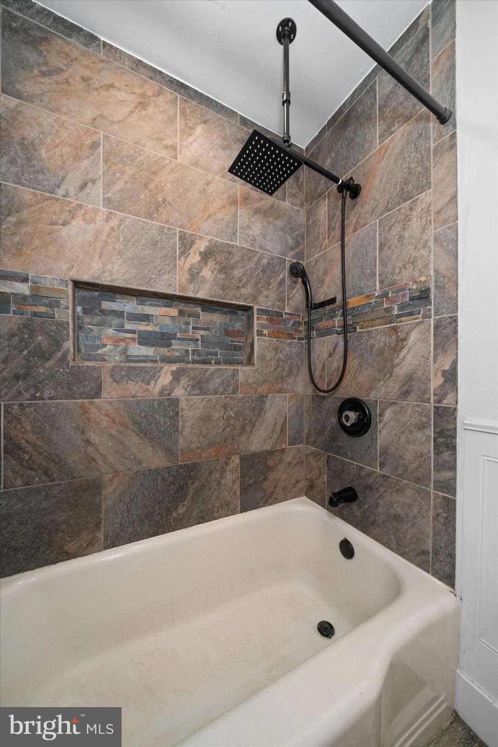 7 2nd Avenue New Castle, DE 19720 - Photo 16 of 44 Sleek modern bath with elegant tile design.