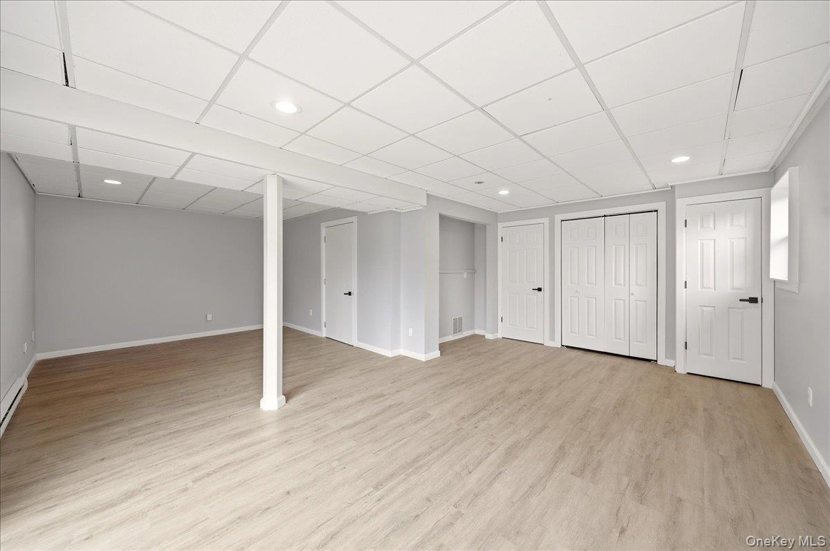 7 Gene Road Middletown, NY 10941 - Photo 33 of 43 Finished below grade area with recessed lighting, a drop ceiling, and light wood-style floors