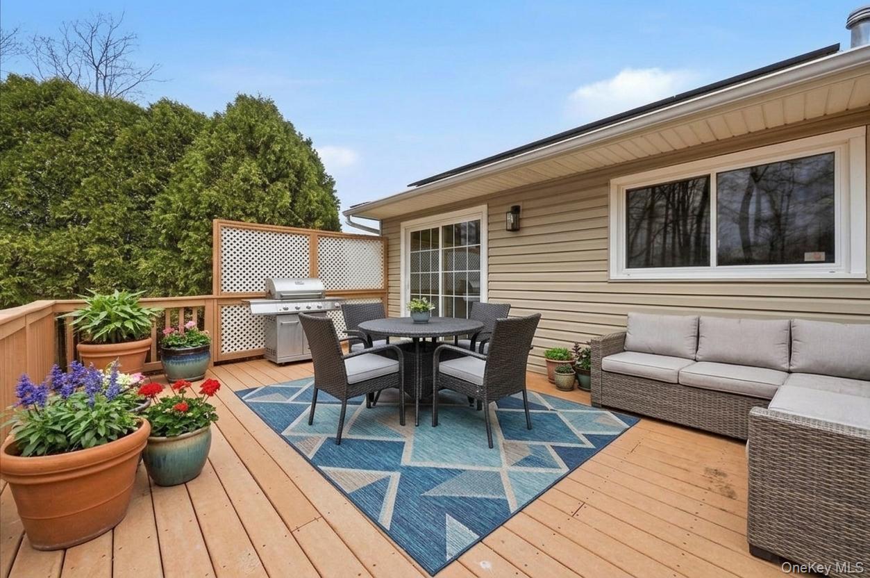 7 Gene Road Middletown, NY 10941 - Photo 35 of 43 Wooden terrace with an outdoor living / dining area and grilling area